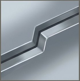 An angular groove stepped across clean plating, machined to no visible purpose.